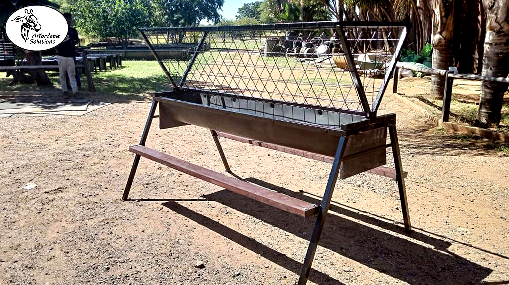 Feed trough with lucerne basket for goats