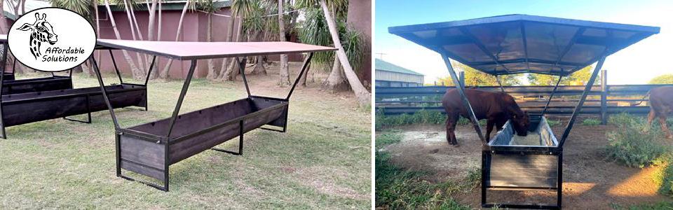 Feeding troughs with roofs protect feed against getting wet during rain
